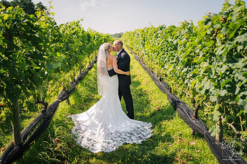 Jennifer + John's Wedding at The Vineyards at Aquebogue — photograph 1 of 100