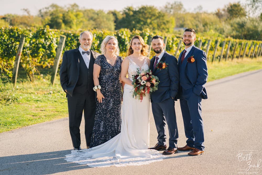 Alexa + Justin's Wedding at Sparkling Pointe Vineyard — photograph 35 of 135