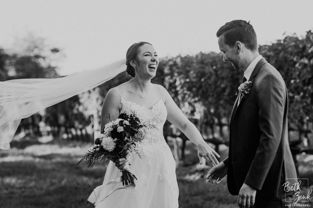 Jennifer + Evan's Wedding at Duck Walk Vineyards — photograph 4 of 187