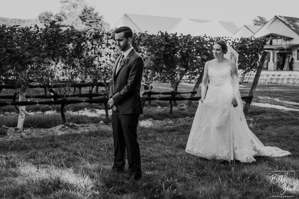 Jennifer + Evan's Wedding at Duck Walk Vineyards — photograph 16 of 187