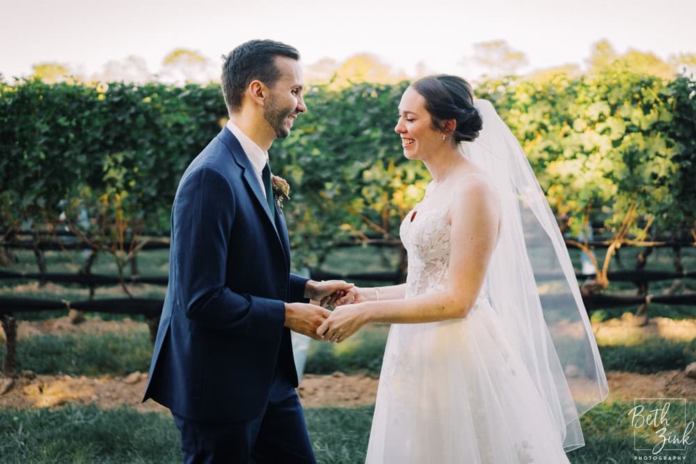Jennifer + Evan's Wedding at Duck Walk Vineyards — photograph 21 of 187