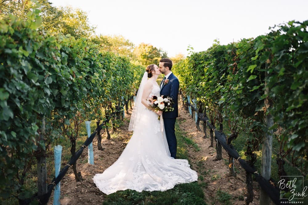 Jennifer + Evan's Wedding at Duck Walk Vineyards — photograph 25 of 187