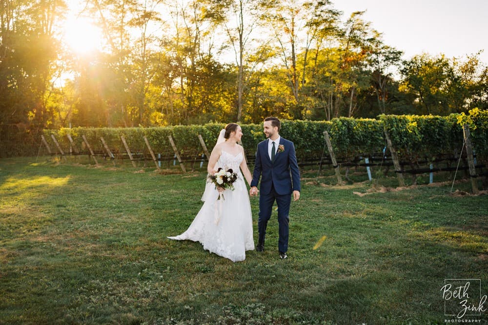 Jennifer + Evan's Wedding at Duck Walk Vineyards — photograph 32 of 187