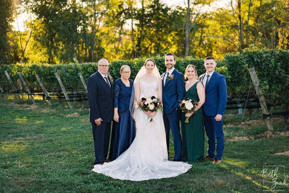 Jennifer + Evan's Wedding at Duck Walk Vineyards — photograph 38 of 187