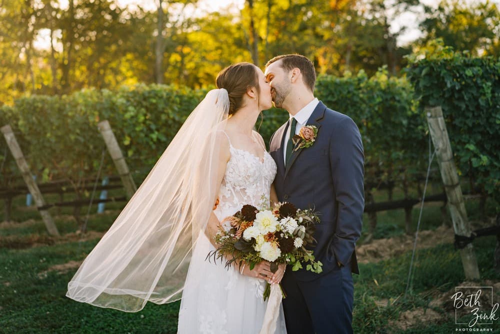 Jennifer + Evan's Wedding at Duck Walk Vineyards — photograph 44 of 187