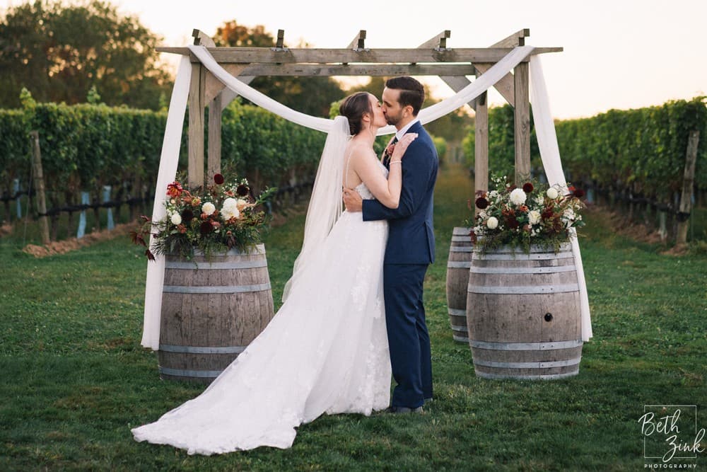 Jennifer + Evan's Wedding at Duck Walk Vineyards — photograph 68 of 187