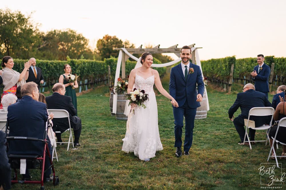 Jennifer + Evan's Wedding at Duck Walk Vineyards — photograph 69 of 187