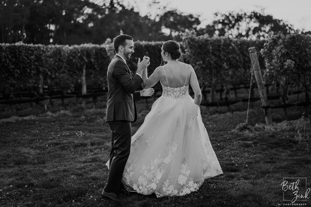 Jennifer + Evan's Wedding at Duck Walk Vineyards — photograph 78 of 187