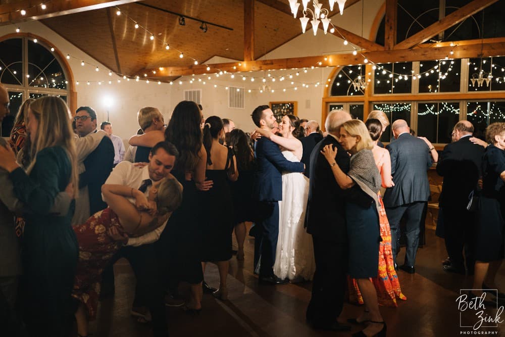 Jennifer + Evan's Wedding at Duck Walk Vineyards — photograph 116 of 187
