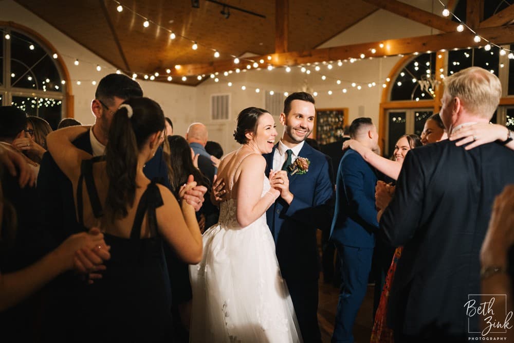 Jennifer + Evan's Wedding at Duck Walk Vineyards — photograph 122 of 187