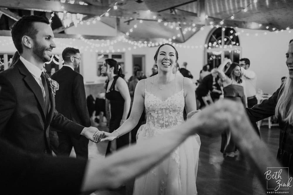 Jennifer + Evan's Wedding at Duck Walk Vineyards — photograph 135 of 187