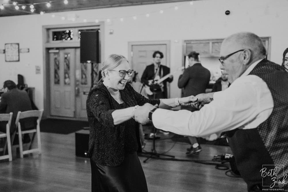 Jennifer + Evan's Wedding at Duck Walk Vineyards — photograph 143 of 187