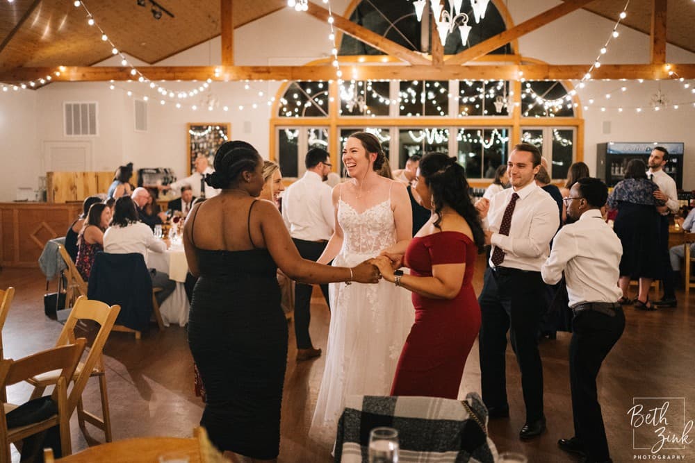 Jennifer + Evan's Wedding at Duck Walk Vineyards — photograph 145 of 187
