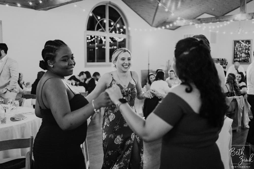 Jennifer + Evan's Wedding at Duck Walk Vineyards — photograph 146 of 187