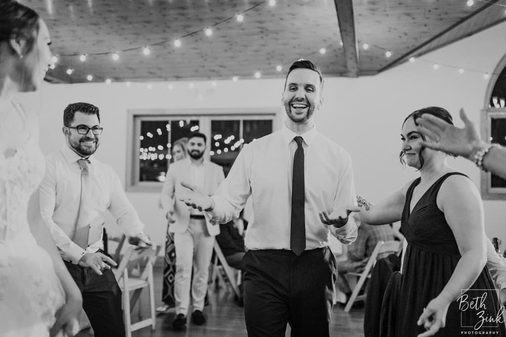 Jennifer + Evan's Wedding at Duck Walk Vineyards — photograph 157 of 187