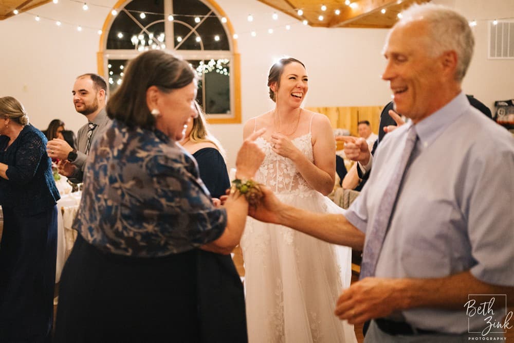 Jennifer + Evan's Wedding at Duck Walk Vineyards — photograph 165 of 187