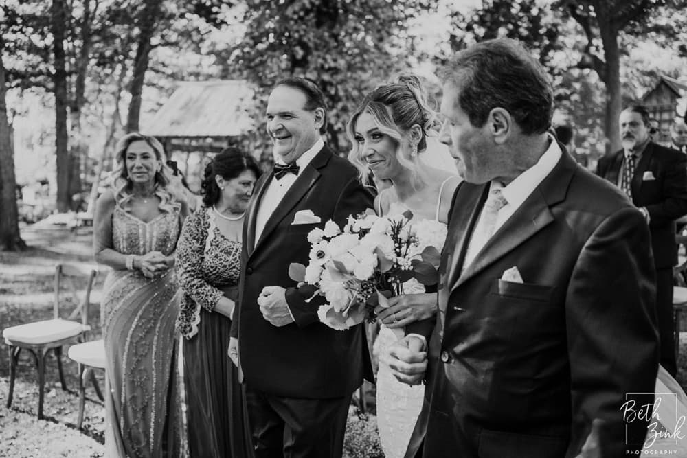 Danielle + Evan's Wedding at Peconic River Herb Farm — photograph 59 of 179